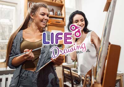 Two women painting
